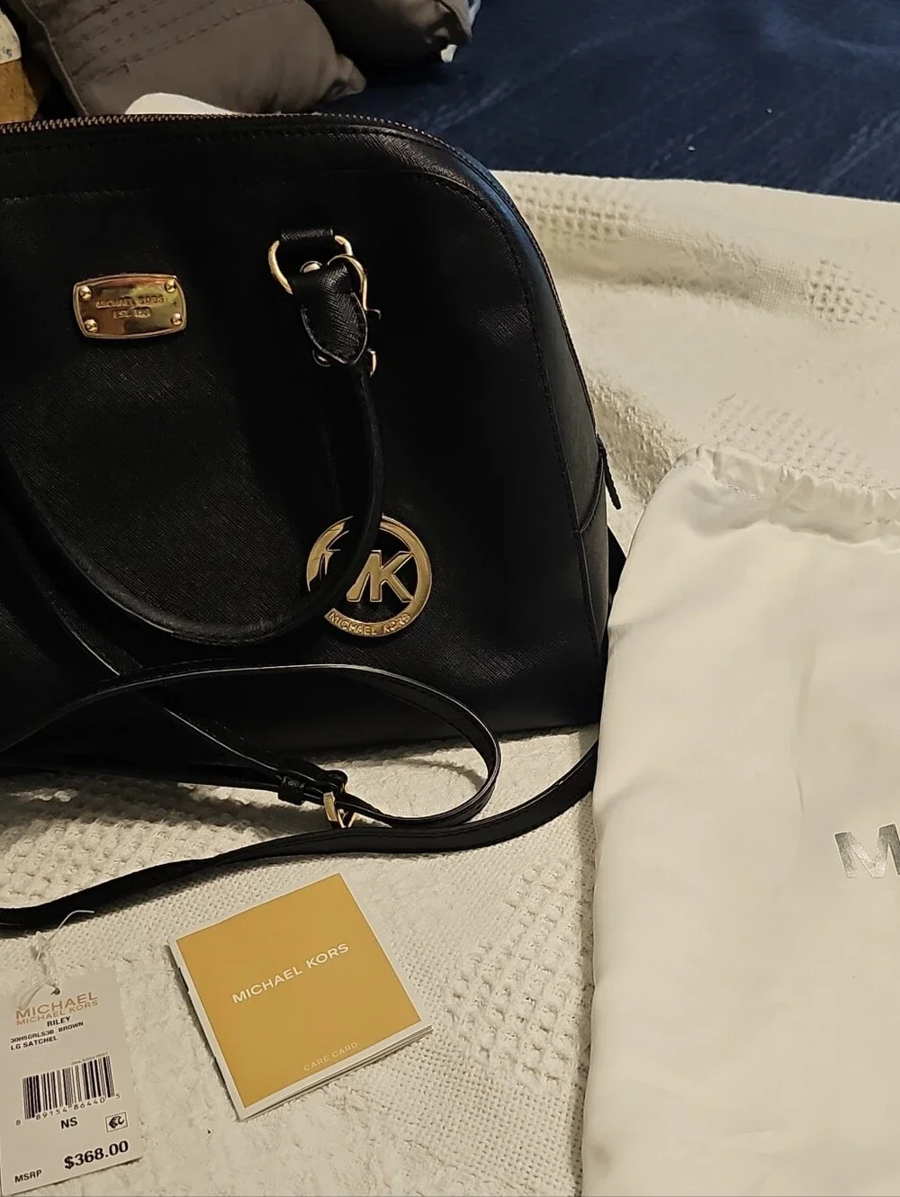 Michael Kors Black Leather Satchel with Gold Accents